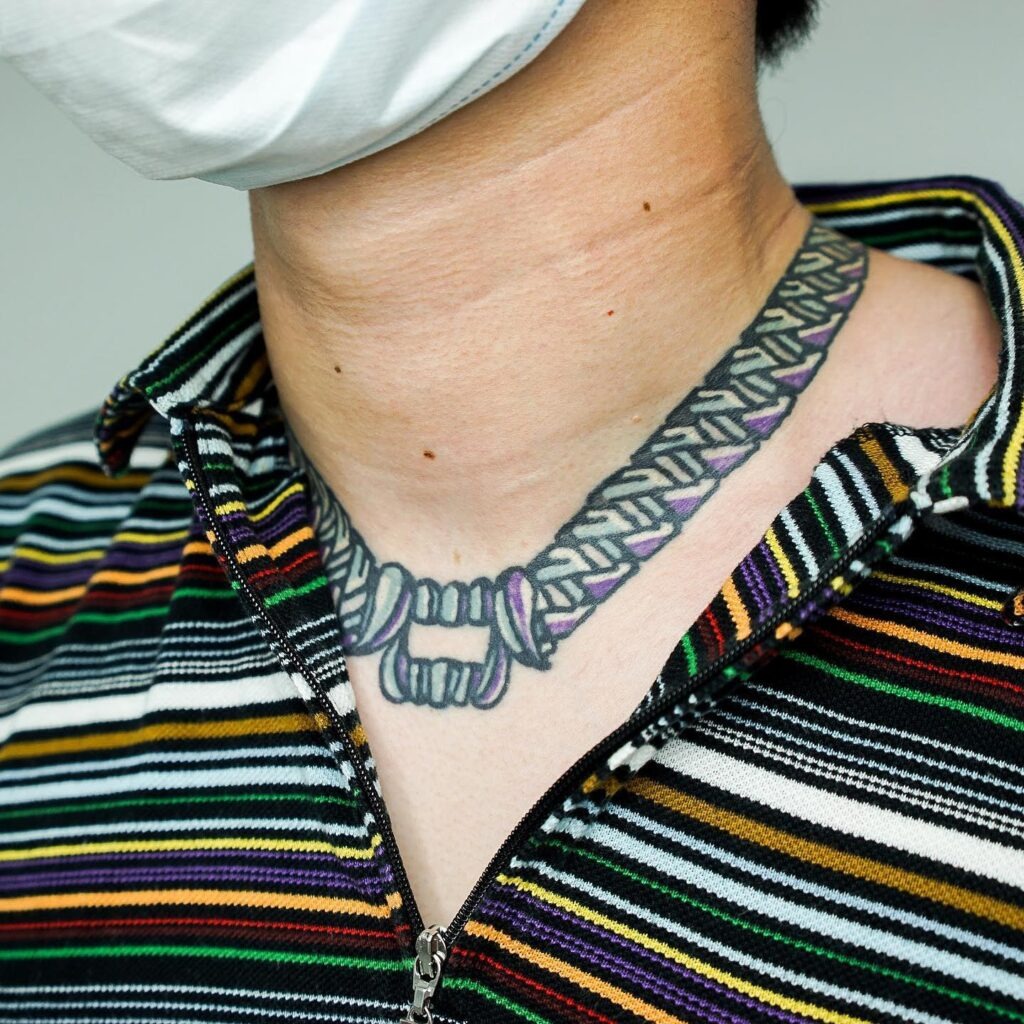 Realistic Dog Tag Necklace Tattoo with Names Tattoo Design