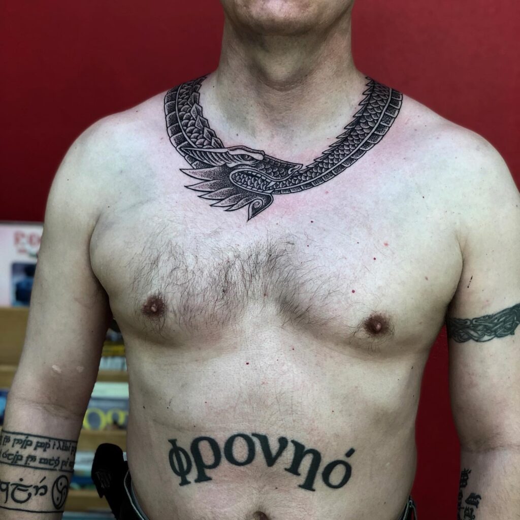 Tribal-Inspired V-Collar Tattoo Tattoo Design