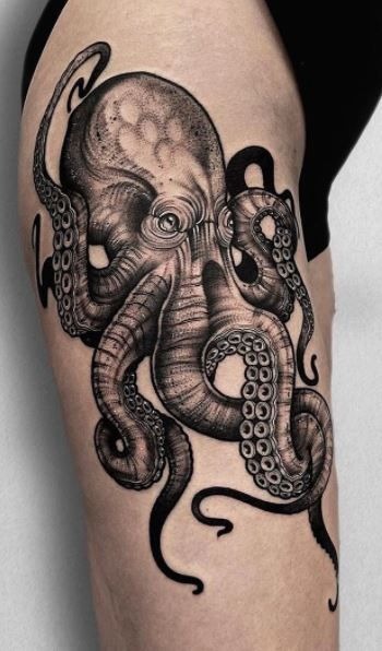 Classic Black Octopus Thigh Tattoo, a tattoo design rendered in intricate detailed.