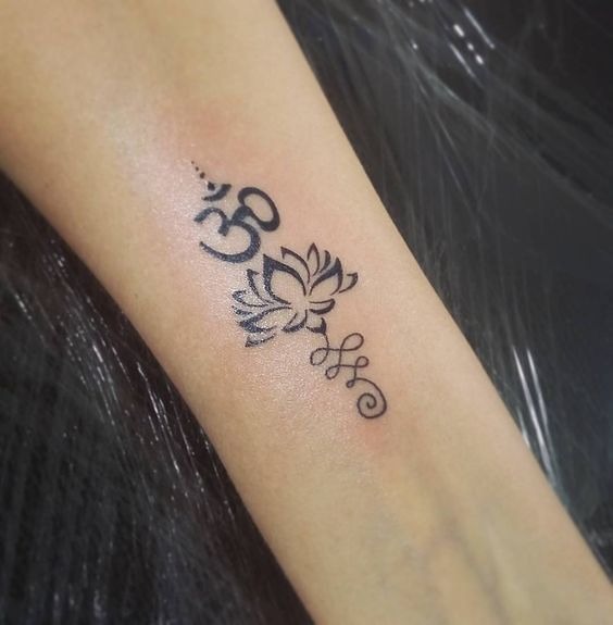 Bold Om On the Hand Tattoo Design
