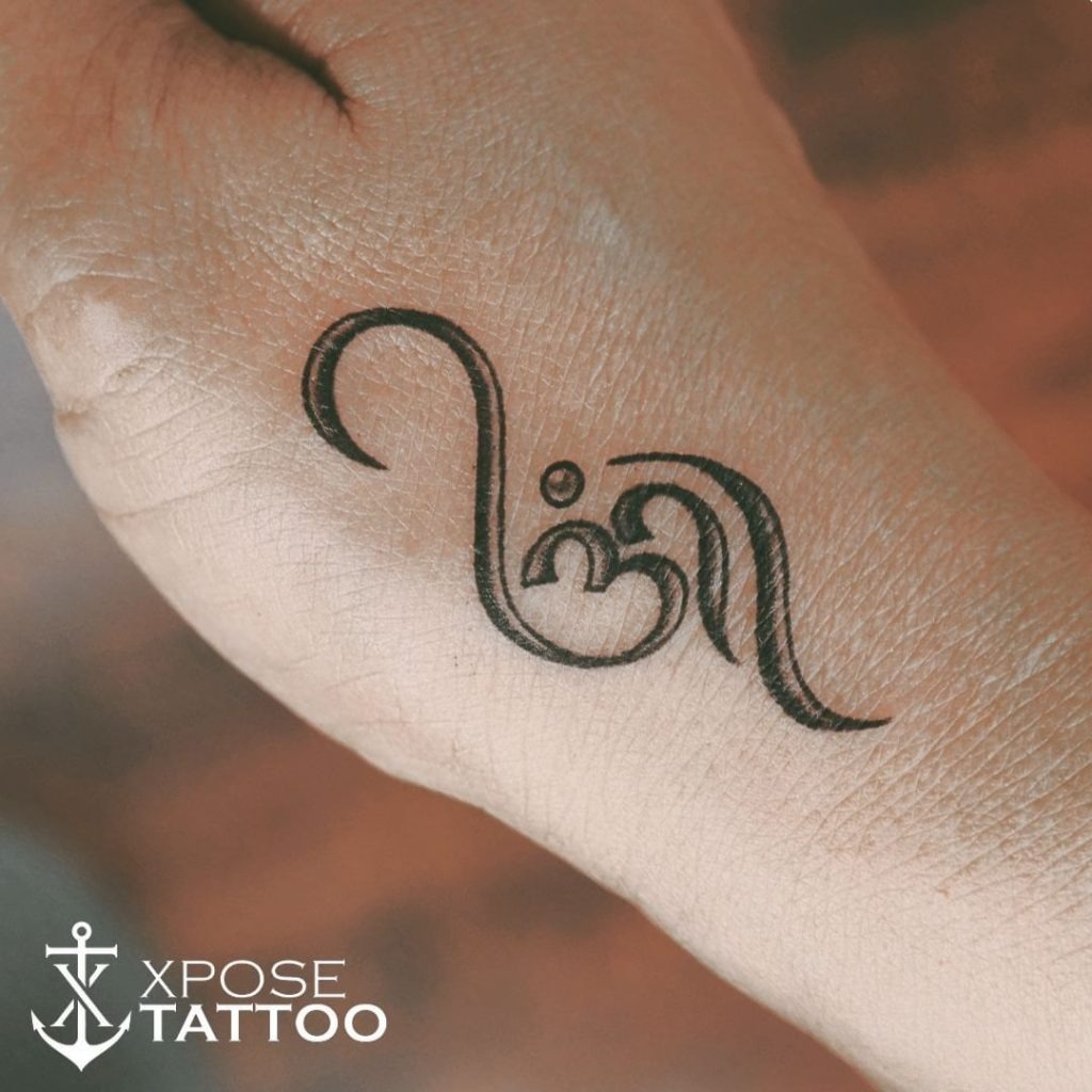 Mini Om Mantra Script Tattoo Design