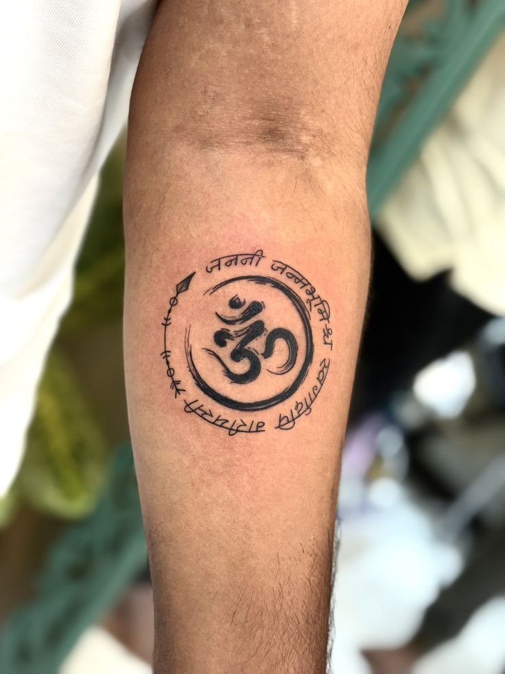 Minimal Om With Lotus Flourish Tattoo Design