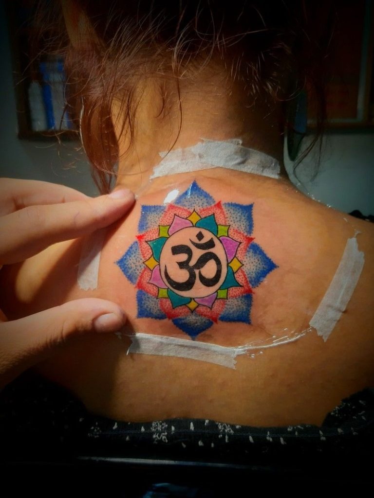 Om Mandala On Neck Back Tattoo Design
