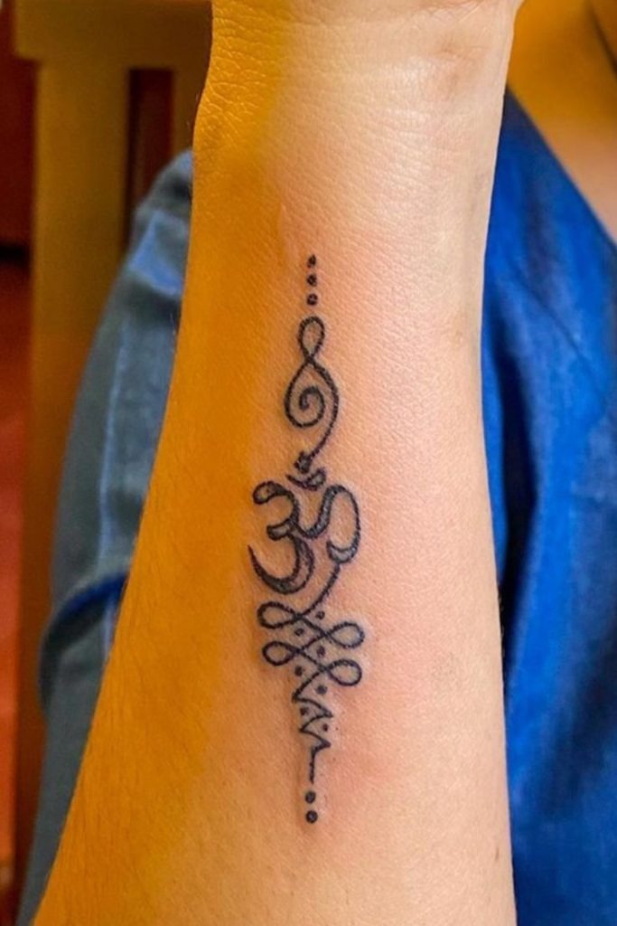 Om With Abstract Brush and Dot Fade Tattoo Design