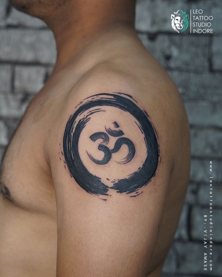 Sunburst Om Shoulder Emblem Tattoo Design