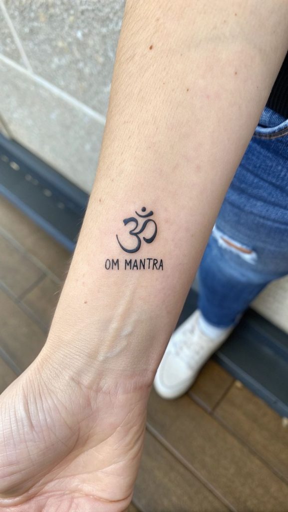 Vertical Om With Infinity Flourish Tattoo Design