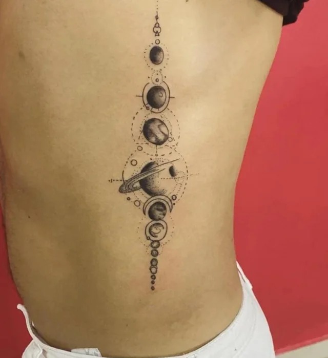 Celestial Bodies and Planetary Alignment Tattoo Design