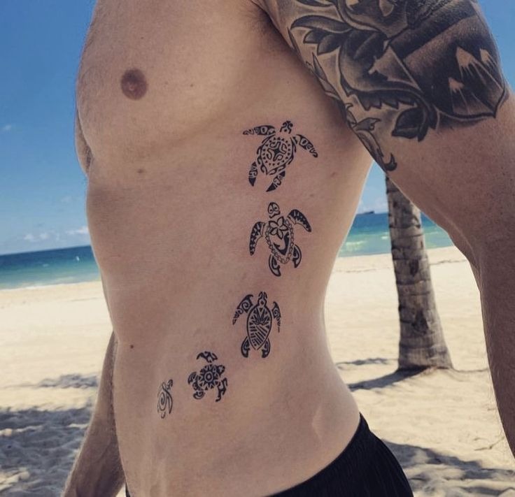 This series of tattoos based on Hawaiian designs follows the chest as a series of traditional turtles illustrating ancestral heritage.