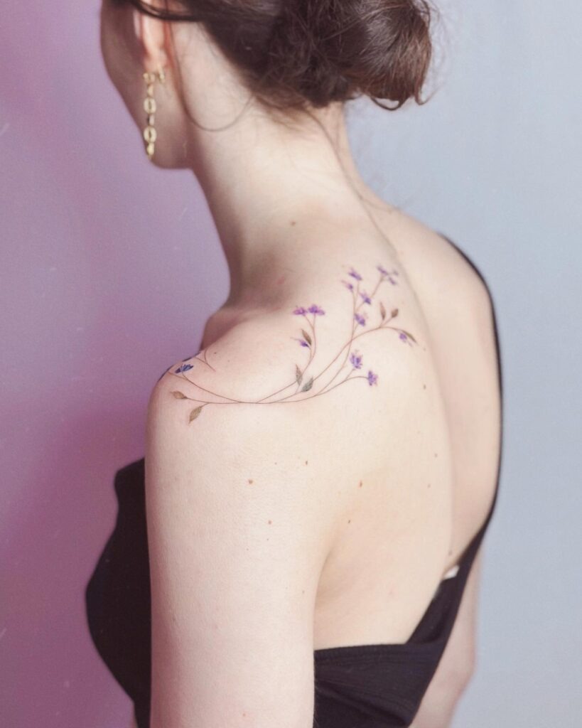 Bold Watercolor Floral Shoulder Tattoo Tattoo Design