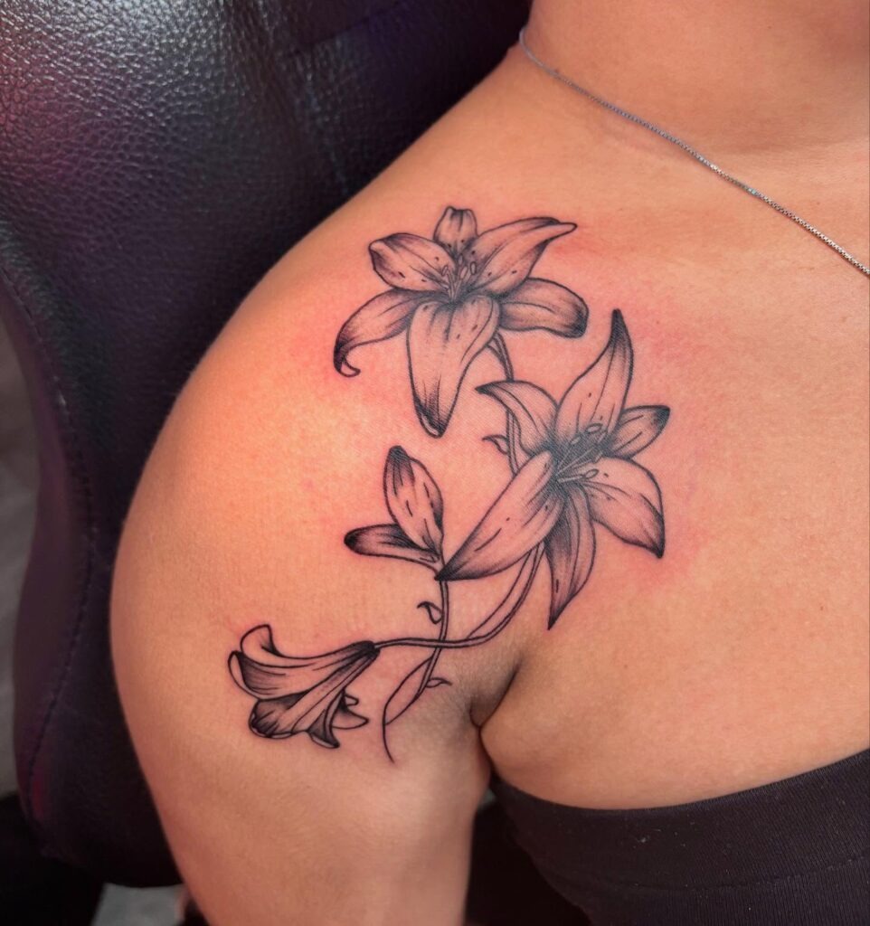 Butterfly and Rose Shoulder Tattoo with Name Tattoo Design