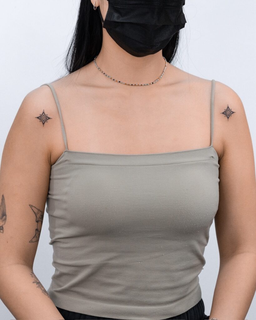 Red Ink Infinity Sun Shoulder Tattoo Tattoo Design