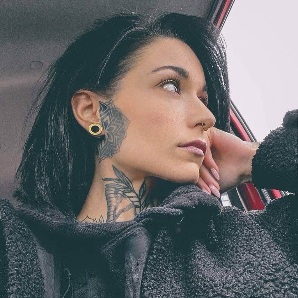 Floral and Leaf Motif on the Cheek Tattoo Design