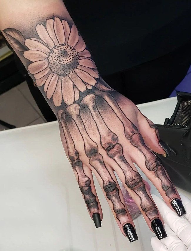 Floral Femininity in Bone Tattoo Design