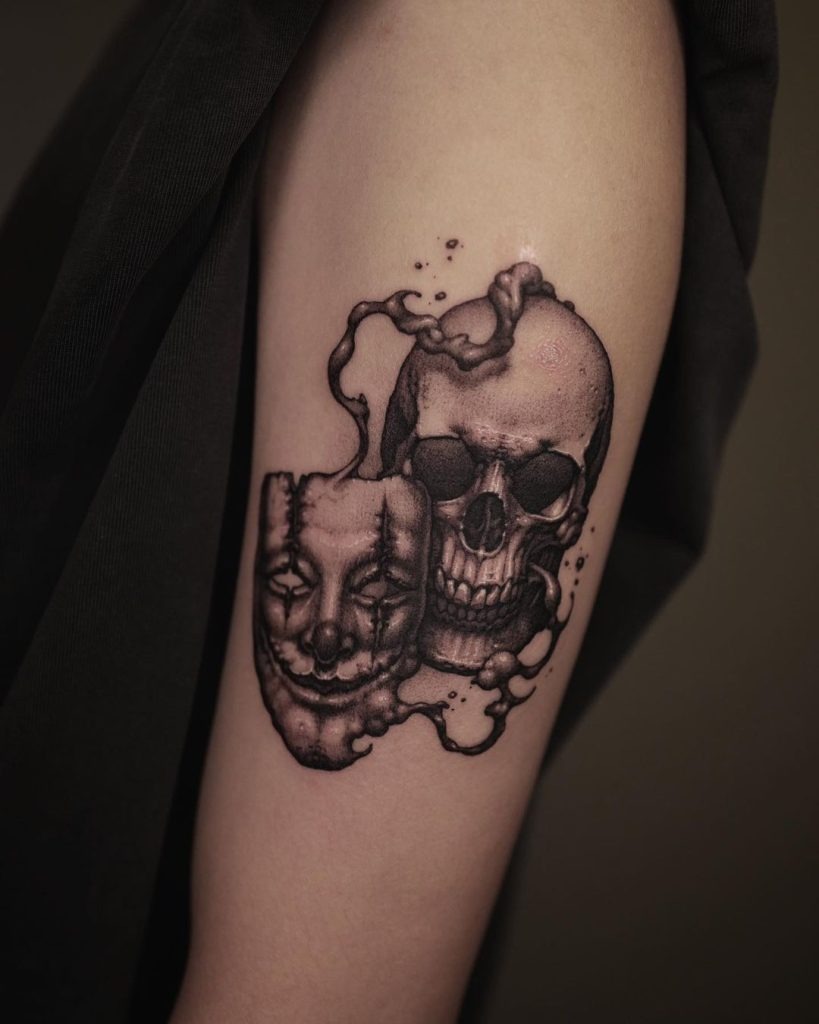 Vibrant Half-Sleeve Skull Tattoo Tattoo Design