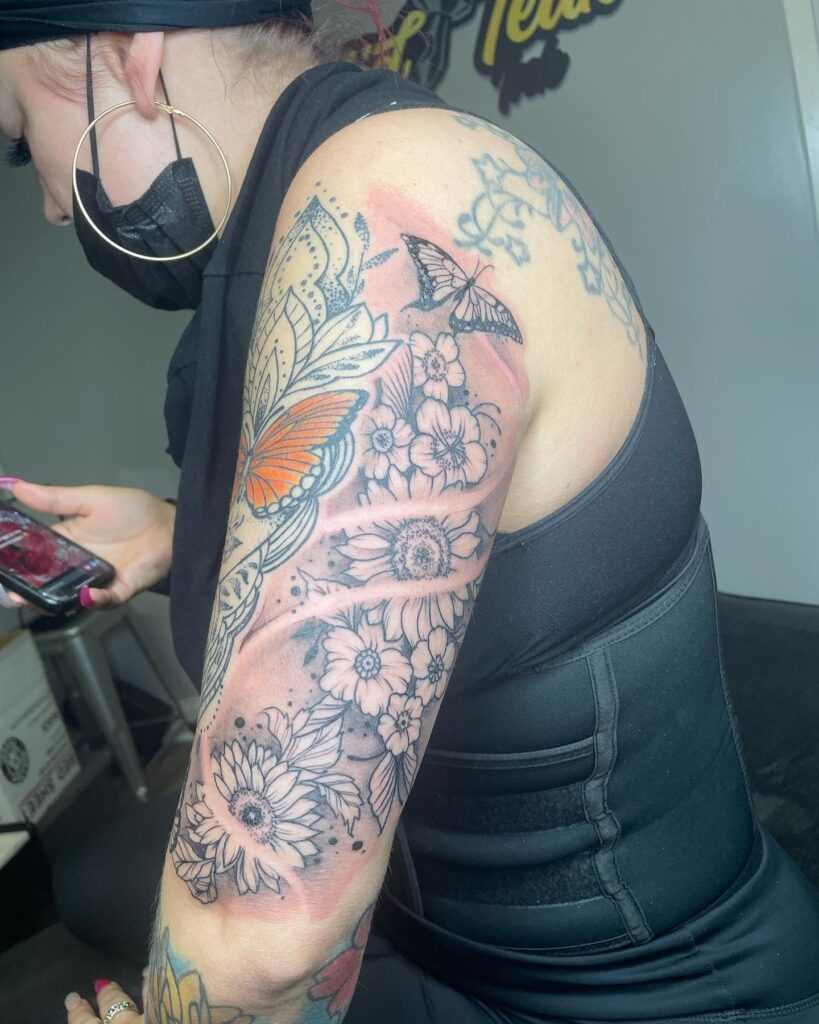 Bloom and Butterfly Sleeve Filler Tattoo Design