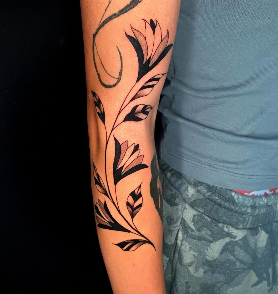 Bold Black Floral Vine Sleeve Filler Tattoo Design