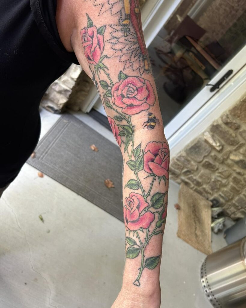 Climbing Roses and Bee Sleeve Filler Tattoo Design