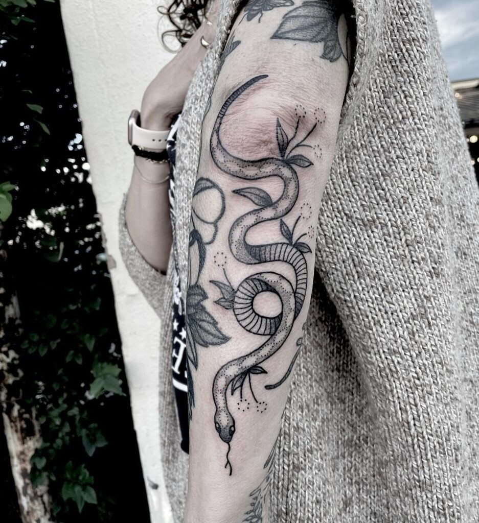 Flowing Snake and Foliage Sleeve Filler Tattoo Design