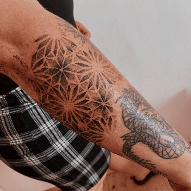 Geometric Starburst Sleeve Filler Tattoo Design