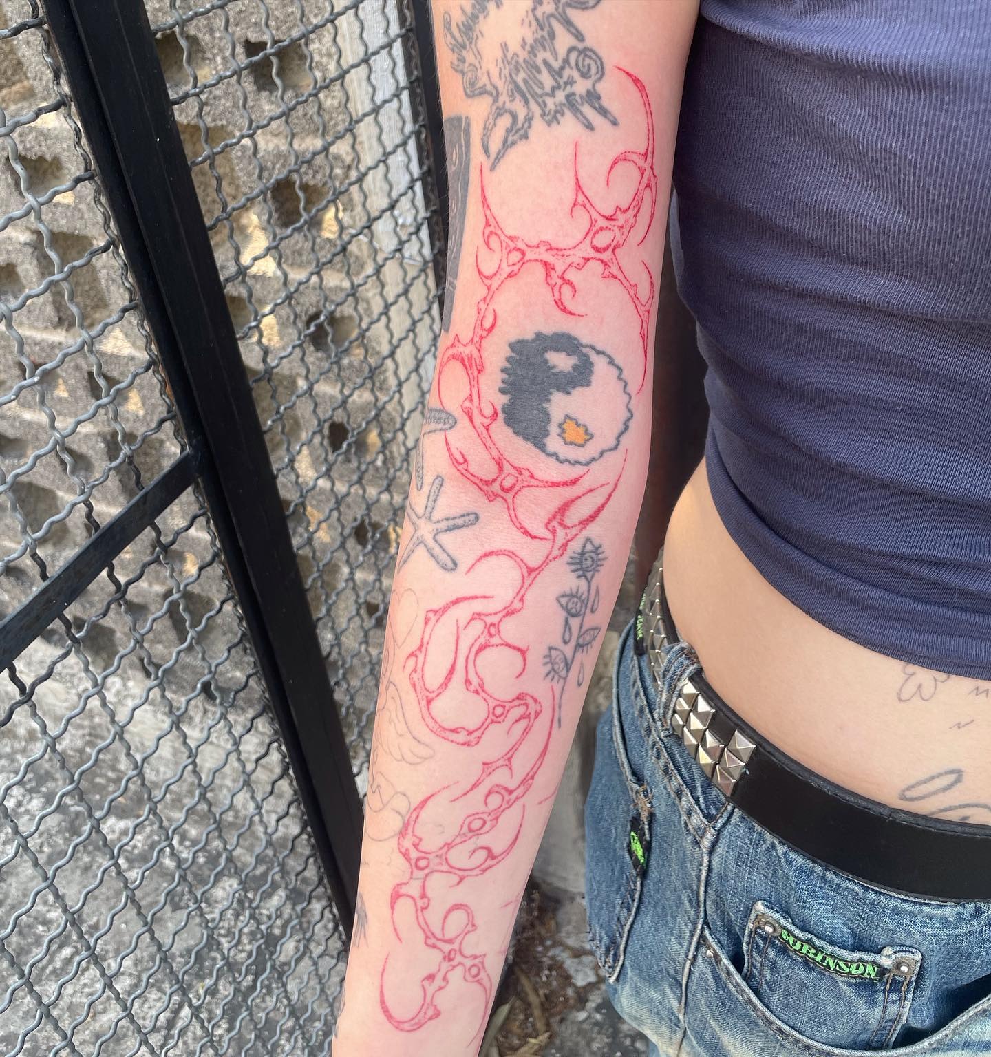 Red Ink Barbed Flow Sleeve Filler Tattoo Design