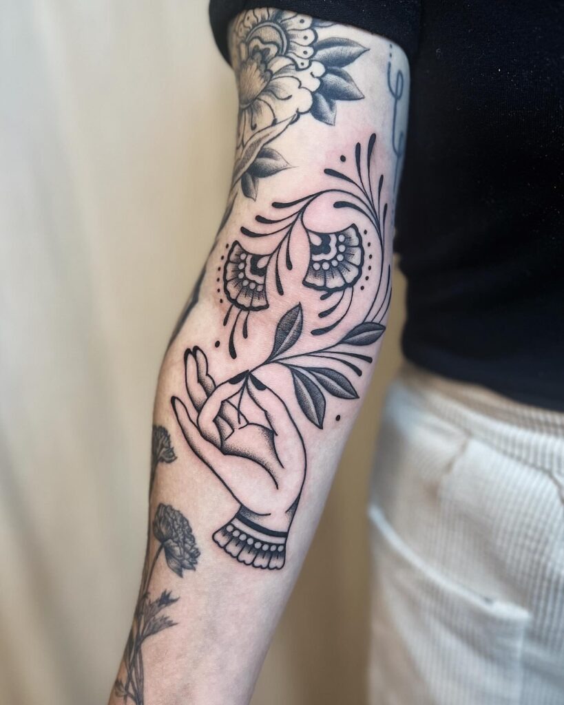 Spiritual Hand and Floral Flow Sleeve Filler Tattoo Design