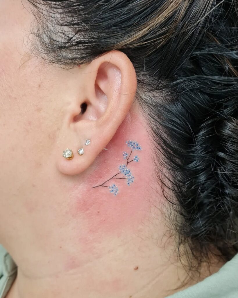 Delicate Blue Wildflower Behind Ear Tattoo Tattoo Design