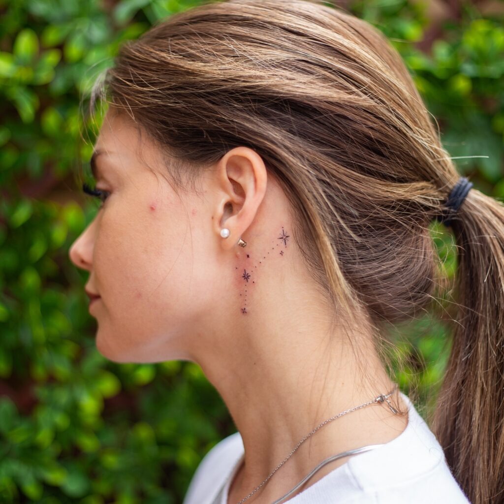 Elegant Feathered Wing Behind Ear Tattoo Tattoo Design