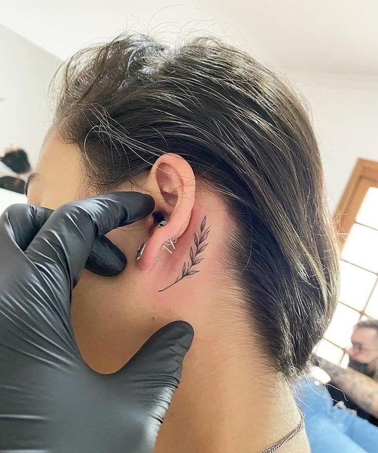 Elegant Leaf Branch Behind the Ear Tattoo Design