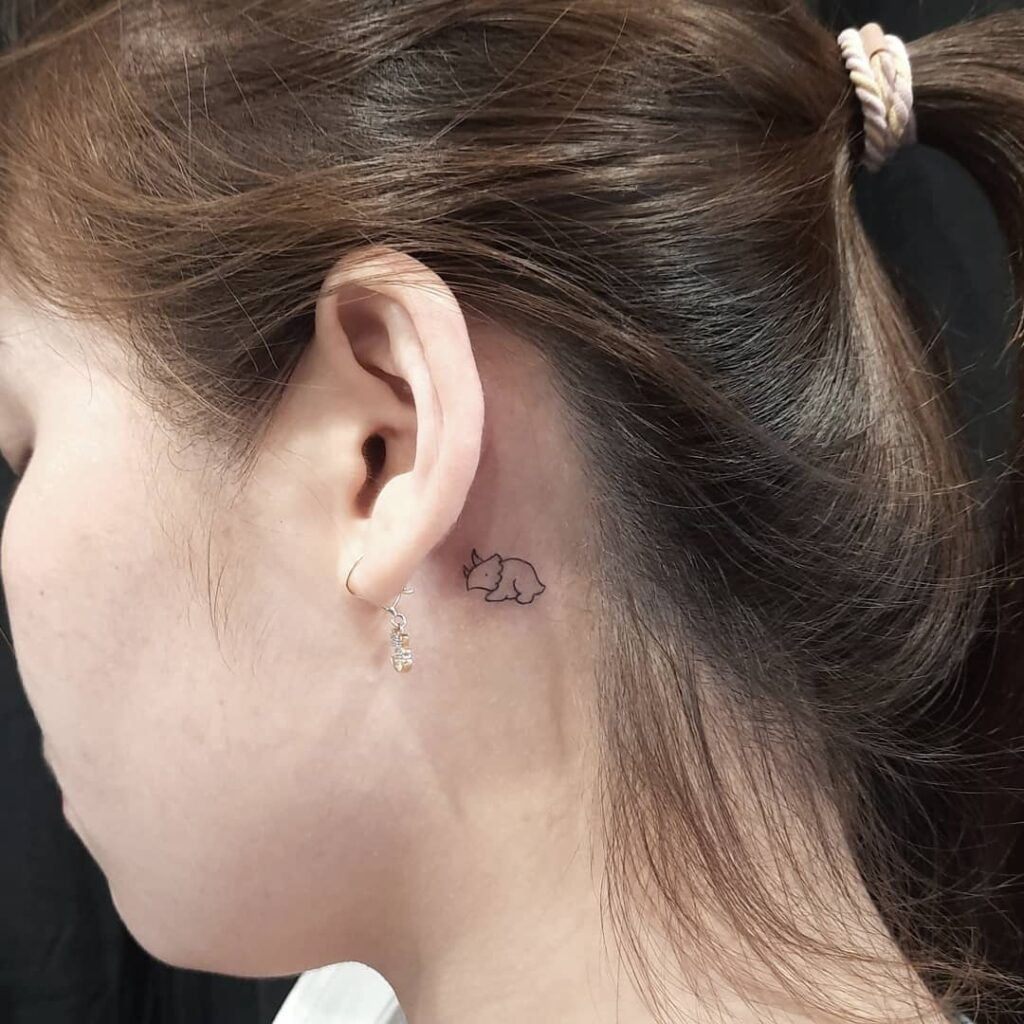 Mini Triceratops Behind Ear Tattoo Tattoo Design