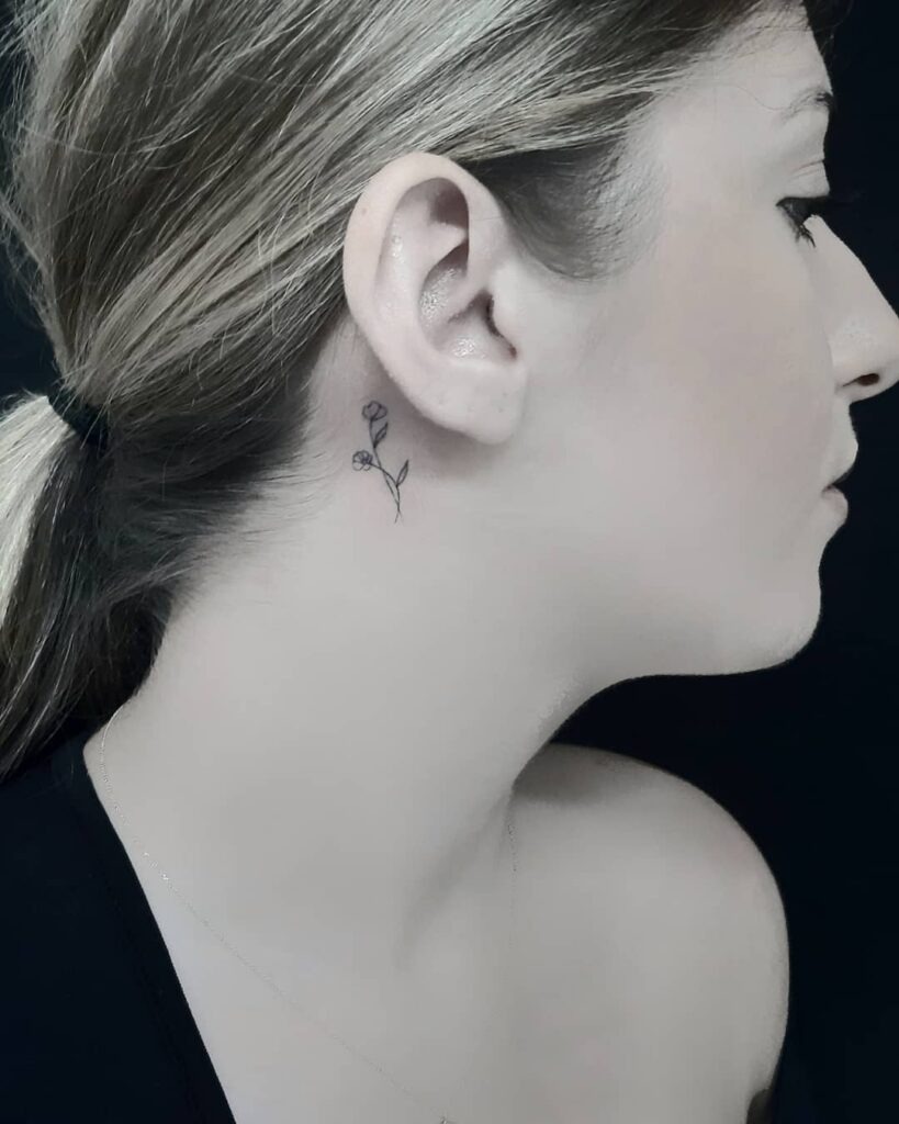 Minimal Rose Stems Behind Ear Tattoo Tattoo Design