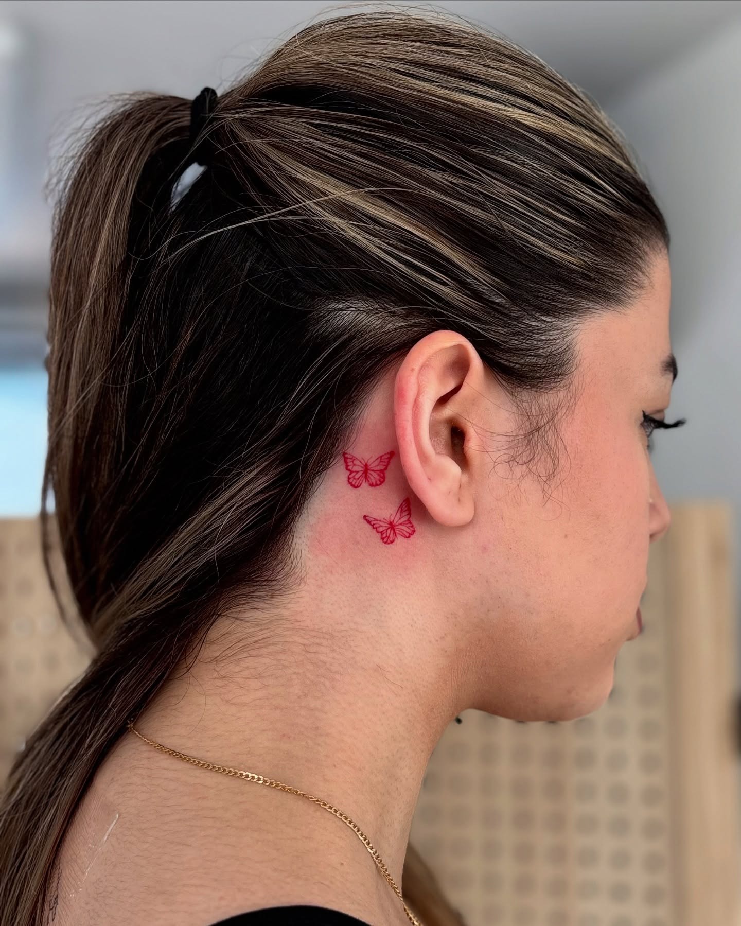Red Twin Butterflies Behind Ear Tattoo Tattoo Design