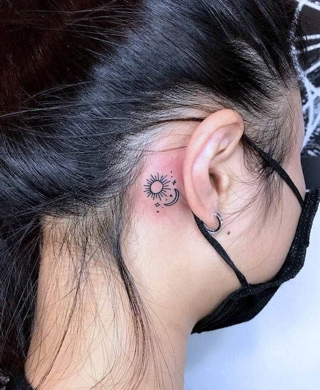 Sun and Moon with Stars Behind the Ear Tattoo Design