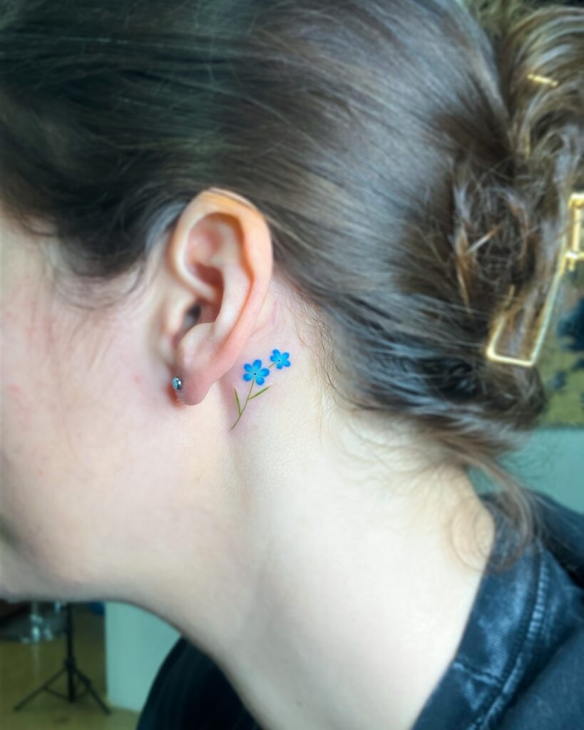 Tiny Black Rose Behind the Ear Tattoo Design