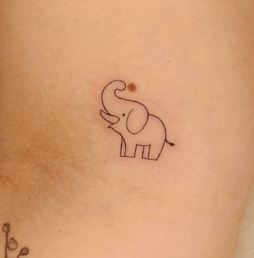 This cute and playful elephant tattoo is perfect for someone seeking a simple design.