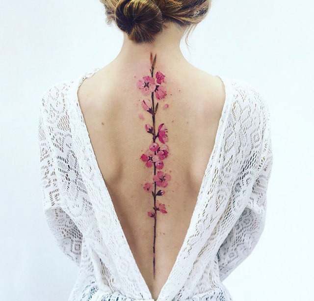 Geometric and Floral Precision Tattoo Design