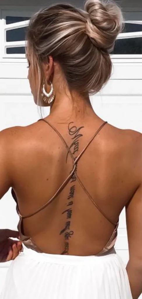 High Bun and Scripted Statements Tattoo Design