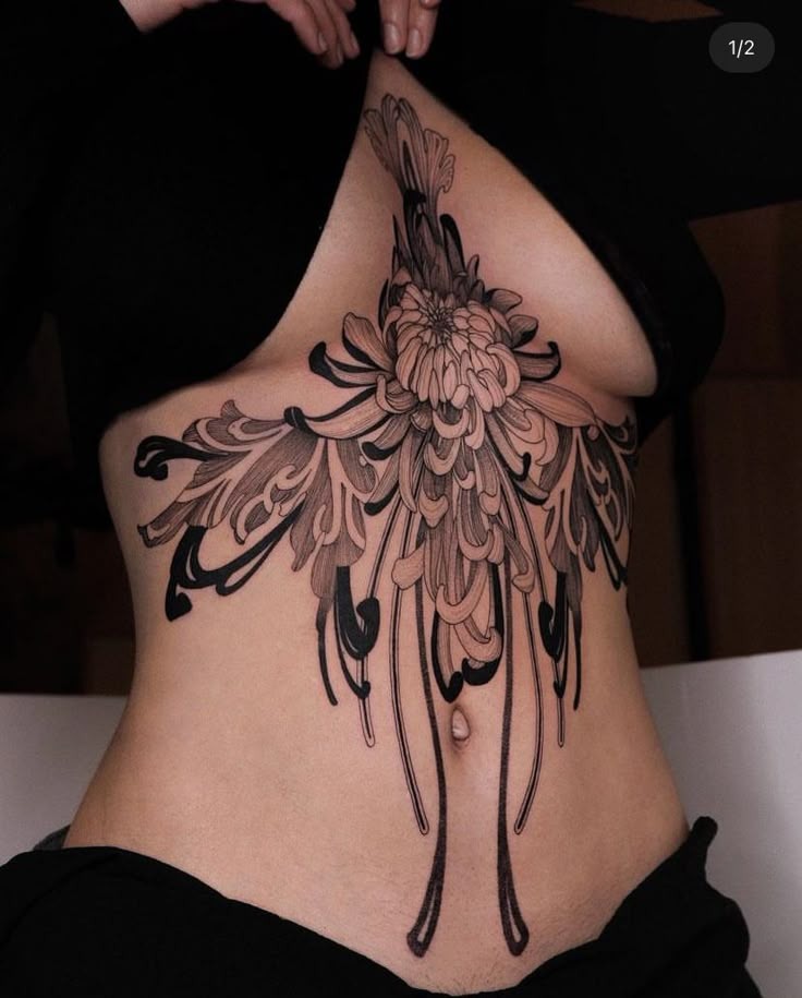 Flowing Chrysanthemum with Bold Petals Tattoo Design