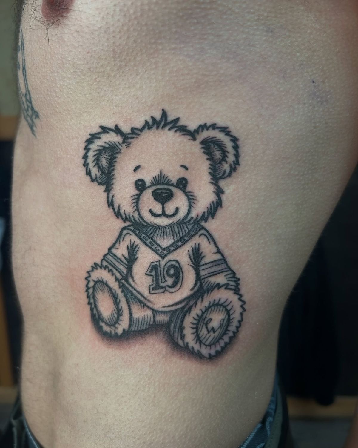 Minimal Teddy Linework Tattoo Design