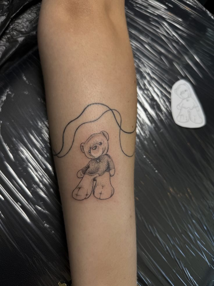 Stitched Teddy with Artistic Frame Tattoo Design