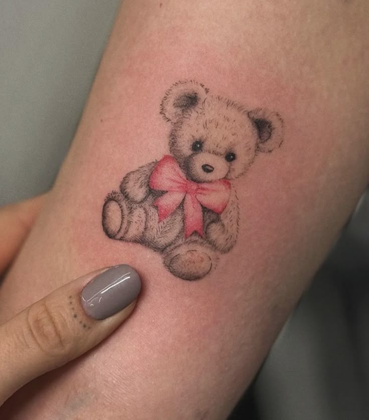 Teddy with Red Ribbon Tattoo Design