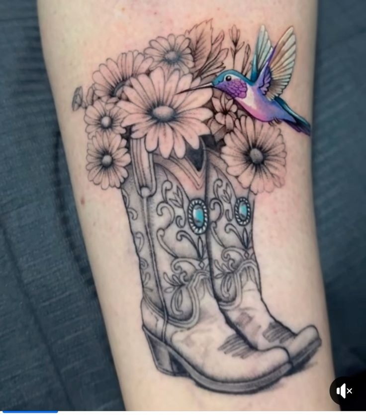 This one feels like Texas romance with a little sparkle, cowgirl boots, soft florals, and a hummingbird that gives it that light, hopeful energy.