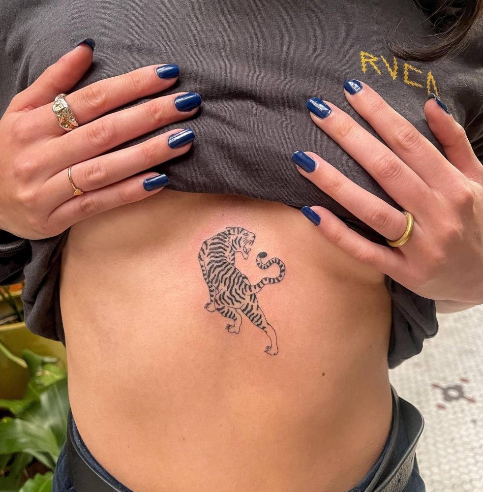Bold Tiger Hip Tattoo Tattoo Design