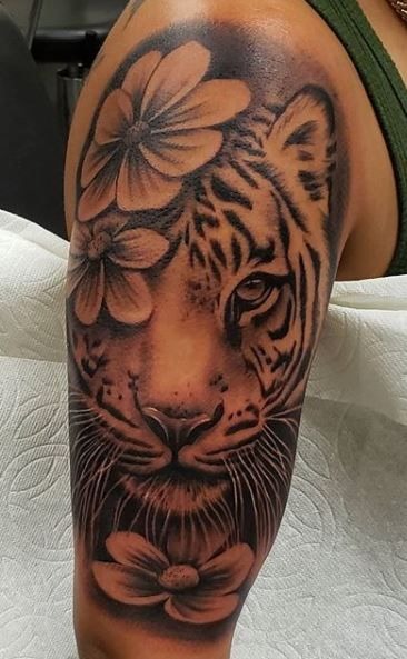Playful Minimalist Tiger Outline Tattoo Design