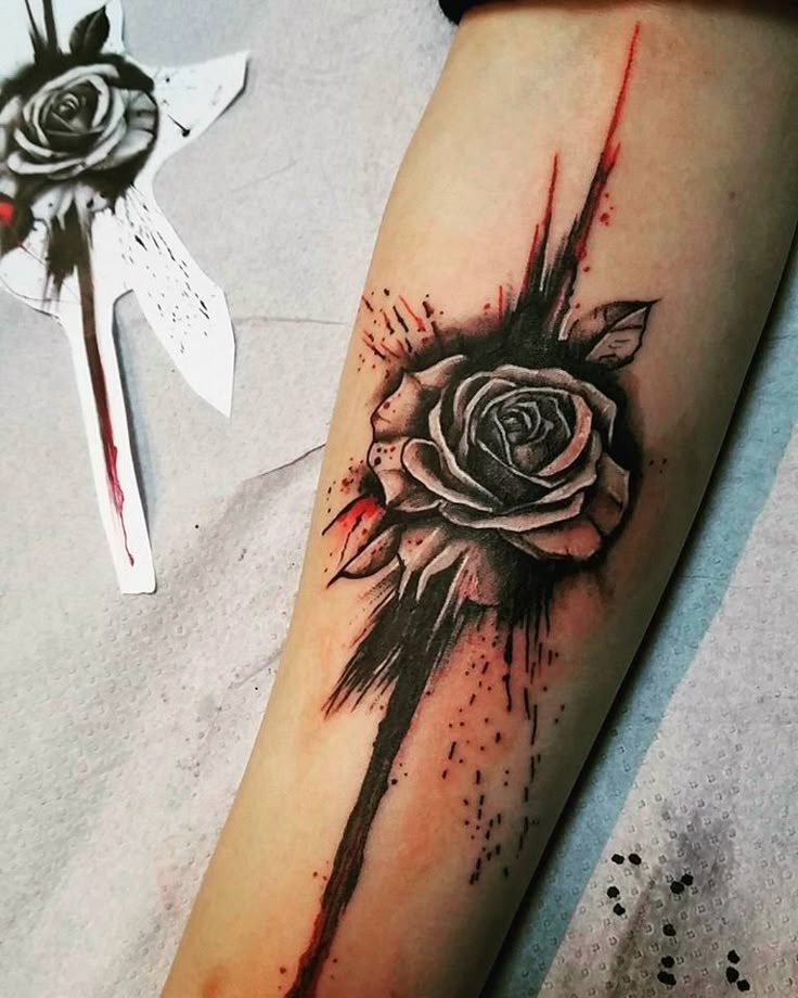 Black Rose and Ink Slash Tattoo Design