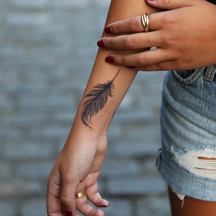 Feather Tattoo on the Forearm Tattoo Design