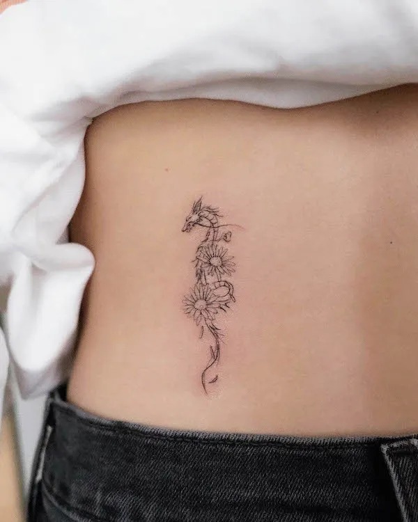 Intricate Dragon and Flower Rib Tattoo Tattoo Design