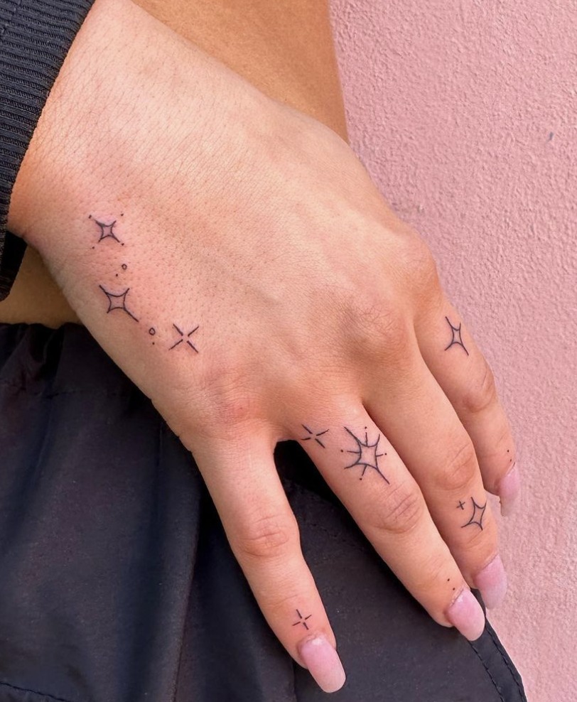 Tiny Star Hand Tattoo Tattoo Design