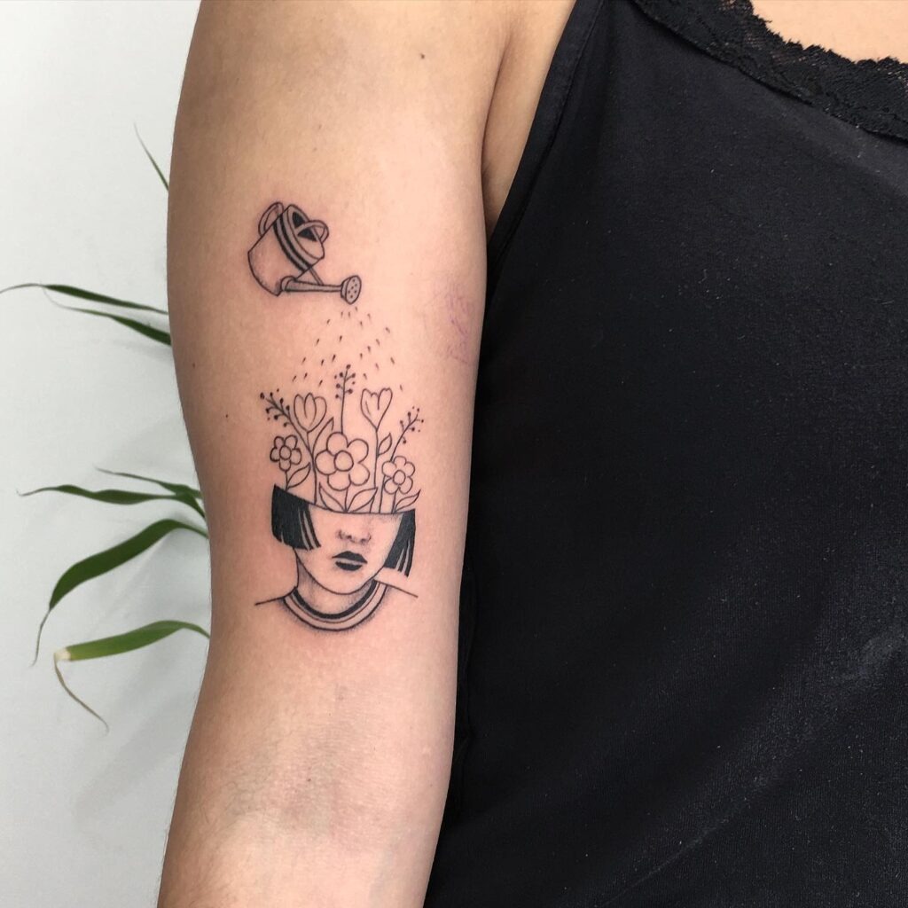 Blooming Mind and Watering Can Upper Arm Tattoo Tattoo Design