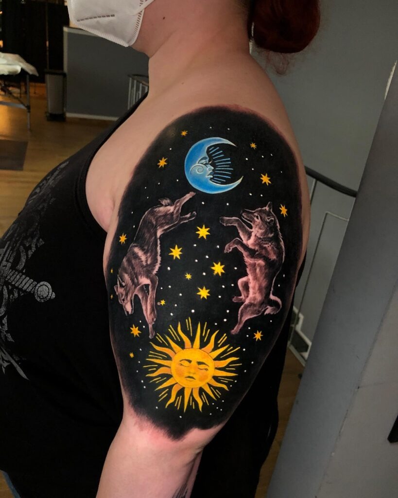 Cosmic Wolves Under Sun and Moon Tattoo Tattoo Design