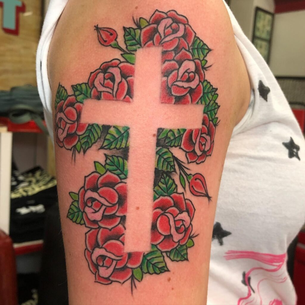 Cross and Roses Negative Space Upper Arm Tattoo Tattoo Design